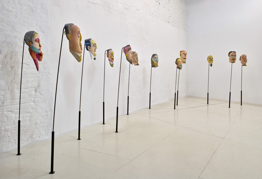 Mauricio Limon Mexican colorful wooden masks in the exhibition at wildpalms 2019