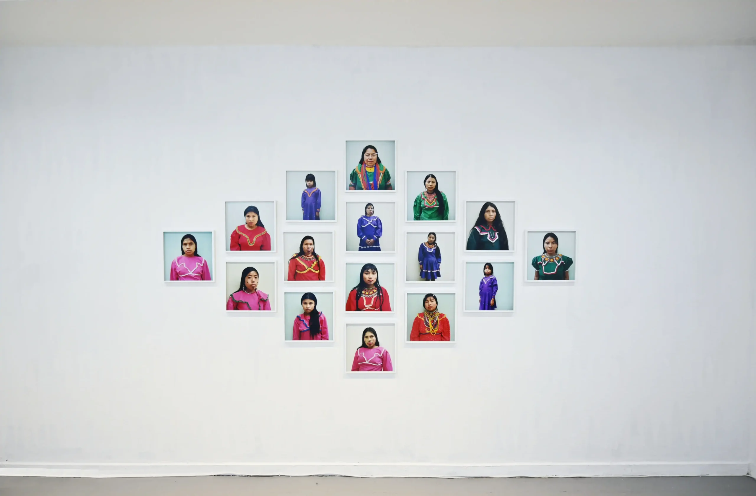 KIMA exhibition view of Jepa, a wall installation of sixteen portraits of Emberá women