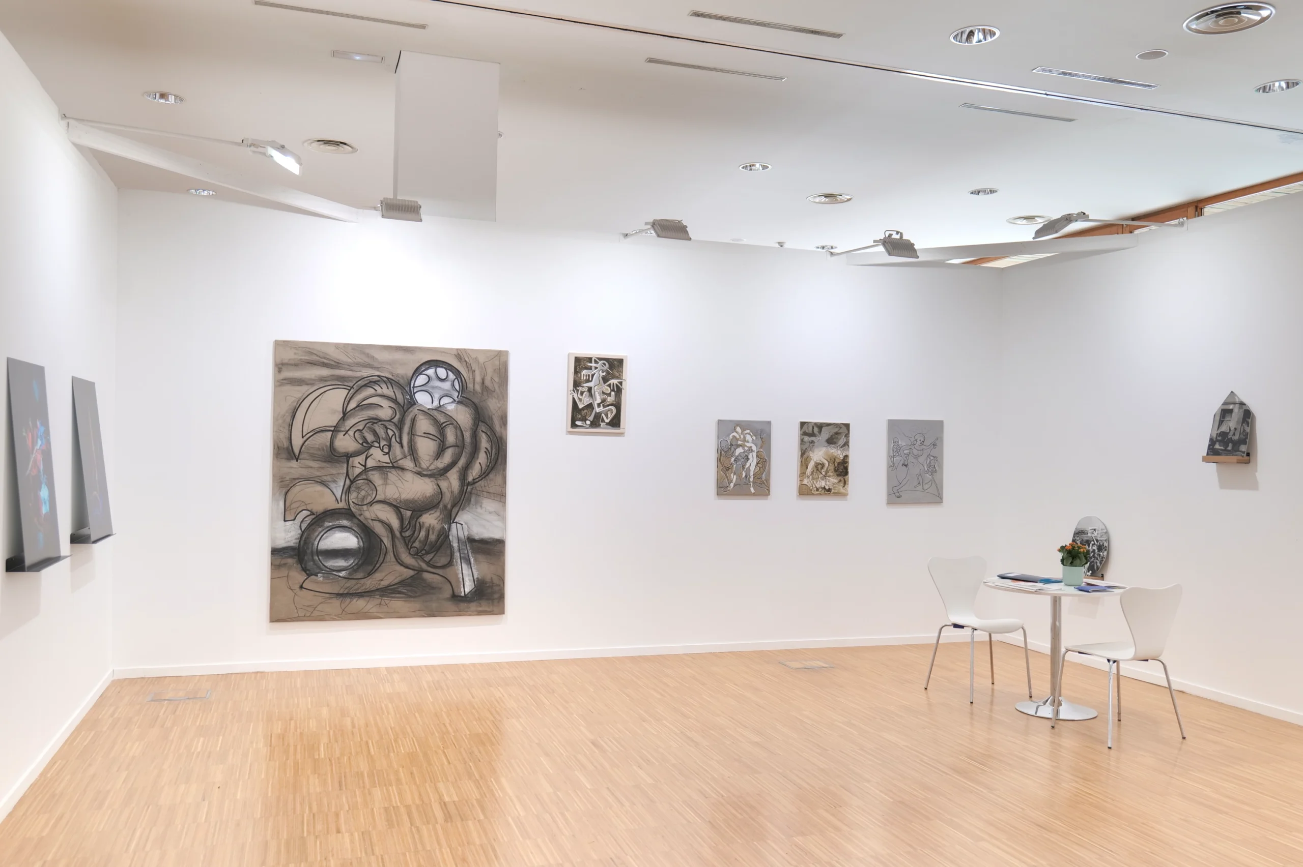 Wide view of the wildpalms booth at ArteSantander 2025 with works by Rachel Libeskind, Felipe Castelblanco and Andreas Steinbrecher