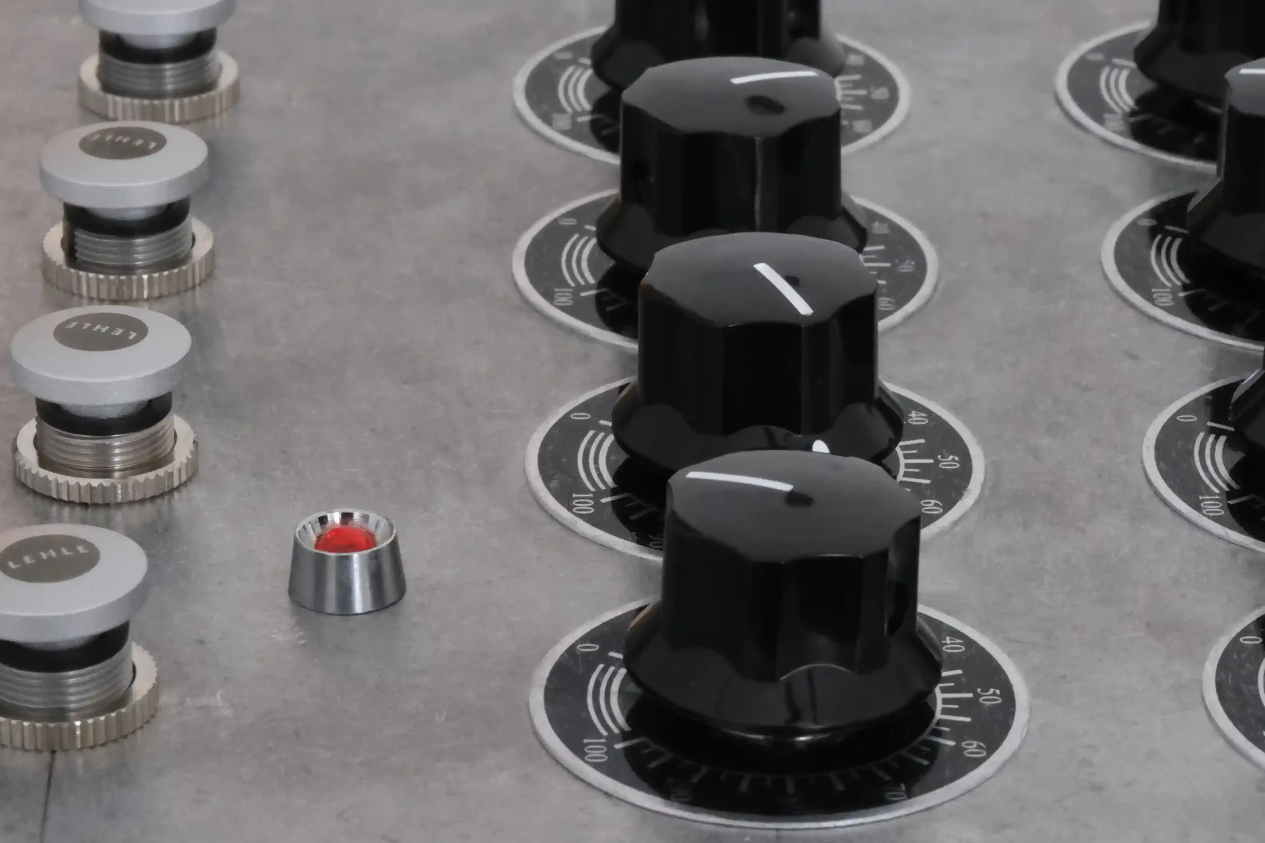 Detail of sound equipment controls in the exhibition To Produce the Sound of Falling Stones
