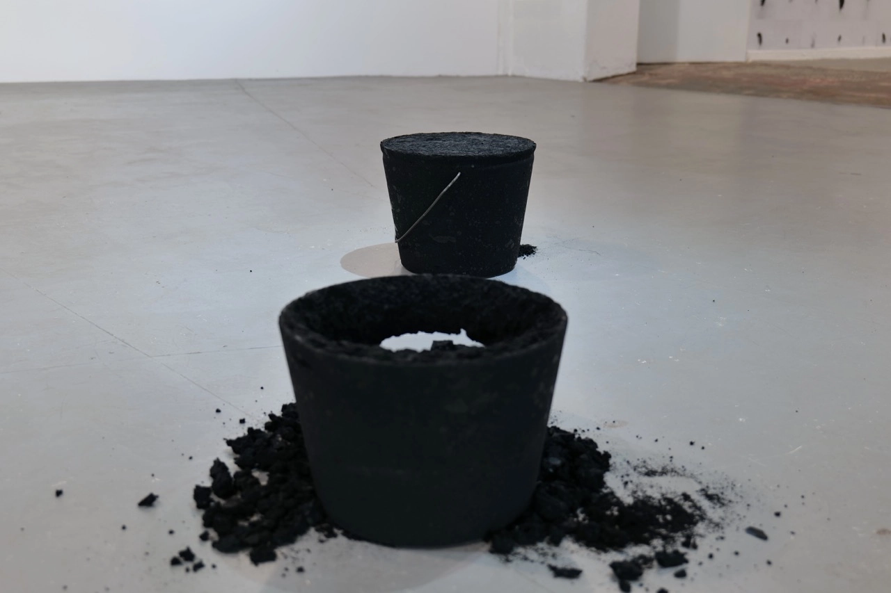 Roberto Uribe Castro artwork installed against a white gallery wall