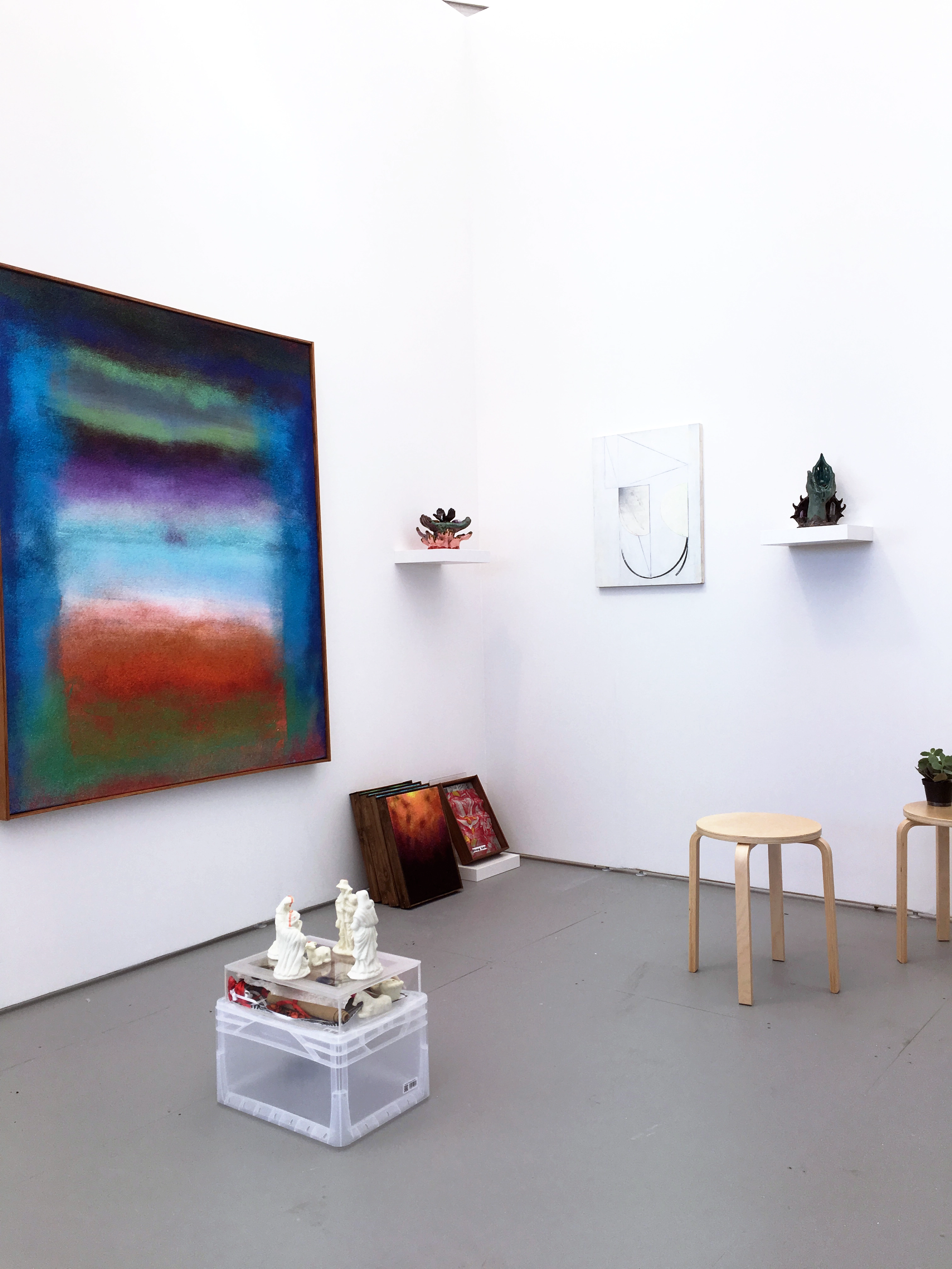 Installation view of the wildpalms booth at UNTITLED Art Fair Miami 2017, with a color-field painting by Nika Fontaine, a panel painting by Jason Duval, and ceramic sculptures by Rachel Libeskind.