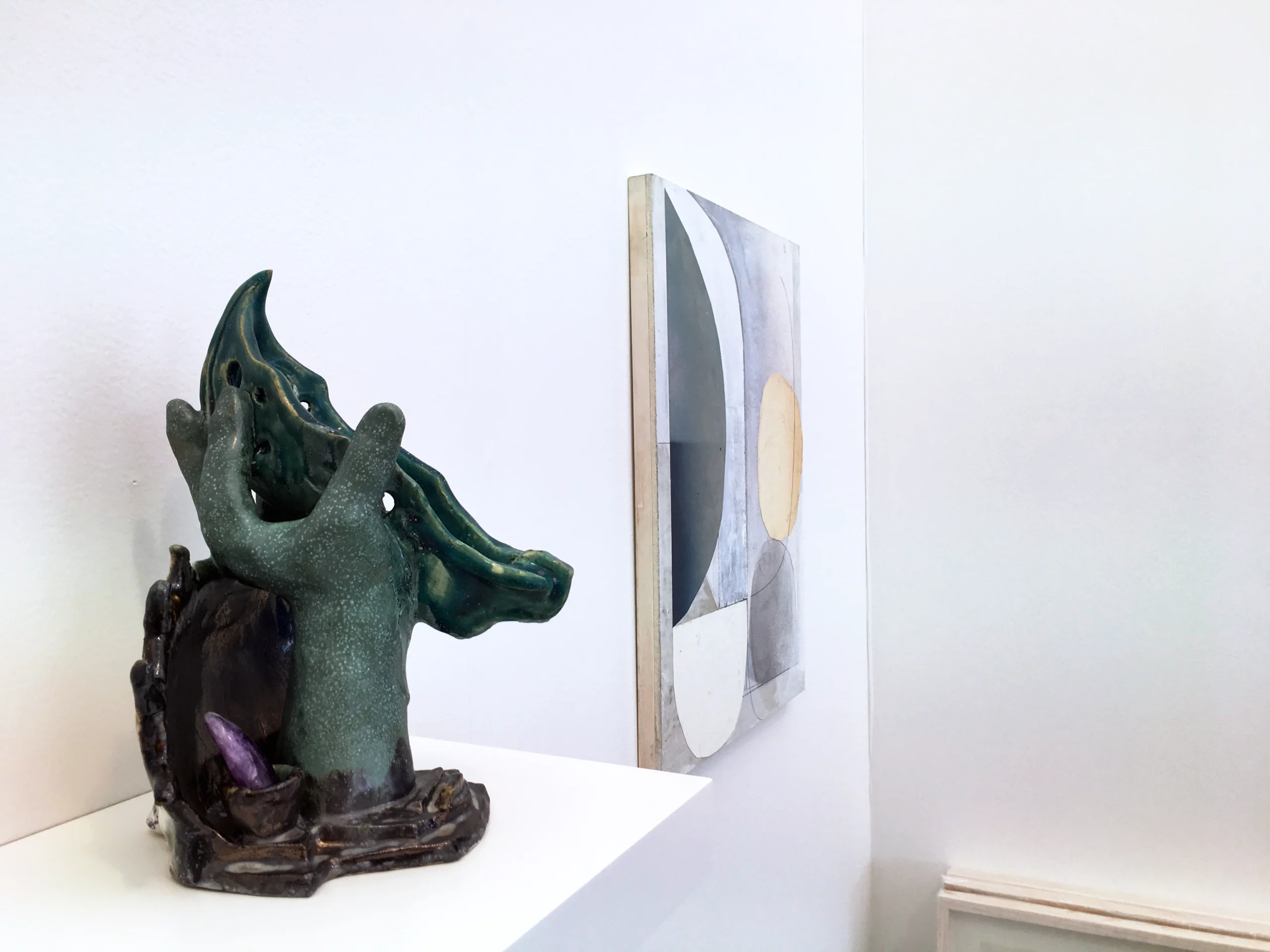 Ceramic sculpture by Rachel Libeskind and a panel painting by Jason Duval at the wildpalms booth, UNTITLED Art Fair Miami 2017.